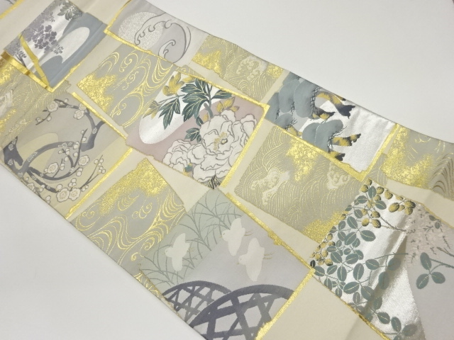 色紙に花々・鳥・荒波模様織出し袋帯